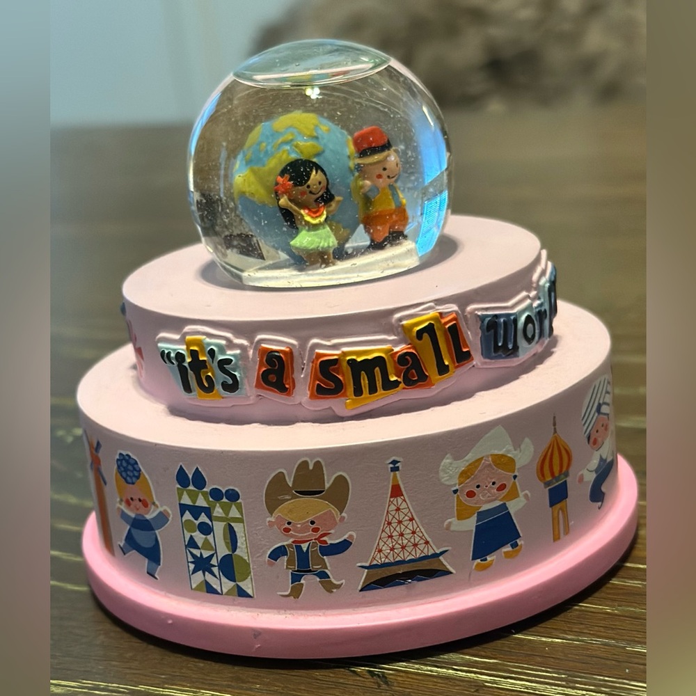 Disney Pink 'It's a Small World' Snow Globe